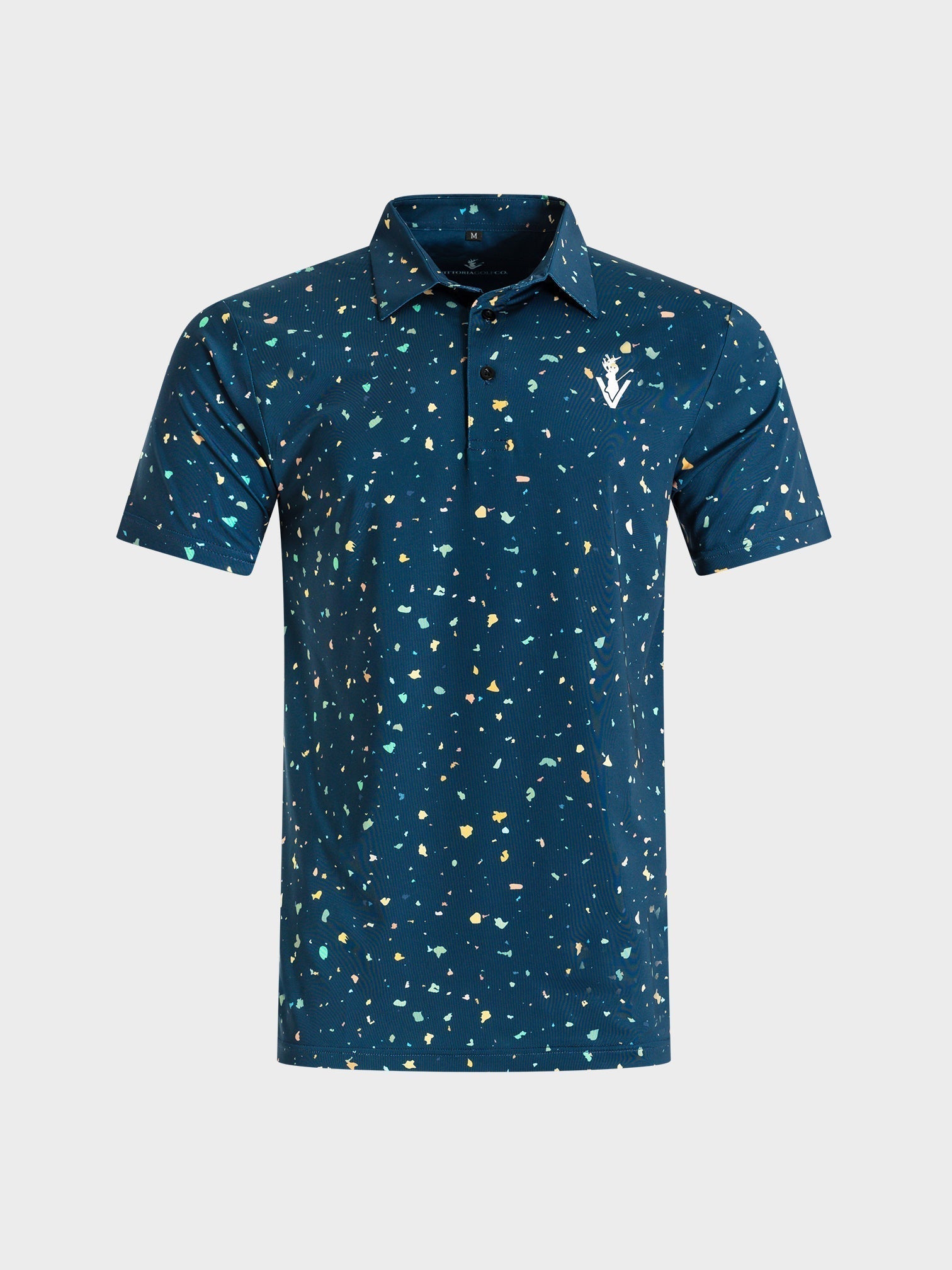 The Underlay polo by VittoriaGolfco in navy with colorful speckled pattern and logo on chest