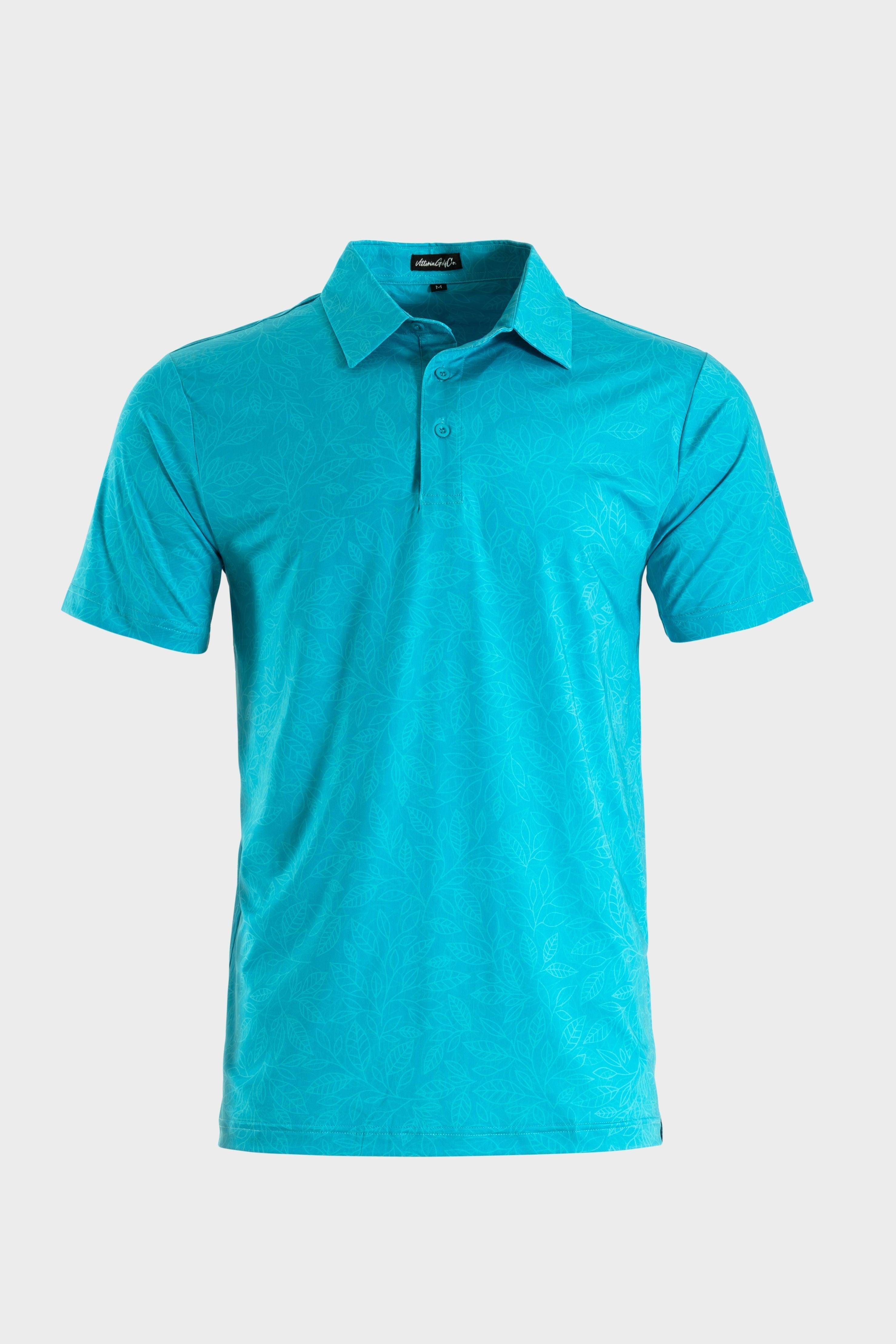 Silent Bloom polo by VittoriaGolfCo in breathable turquoise fabric with subtle floral design