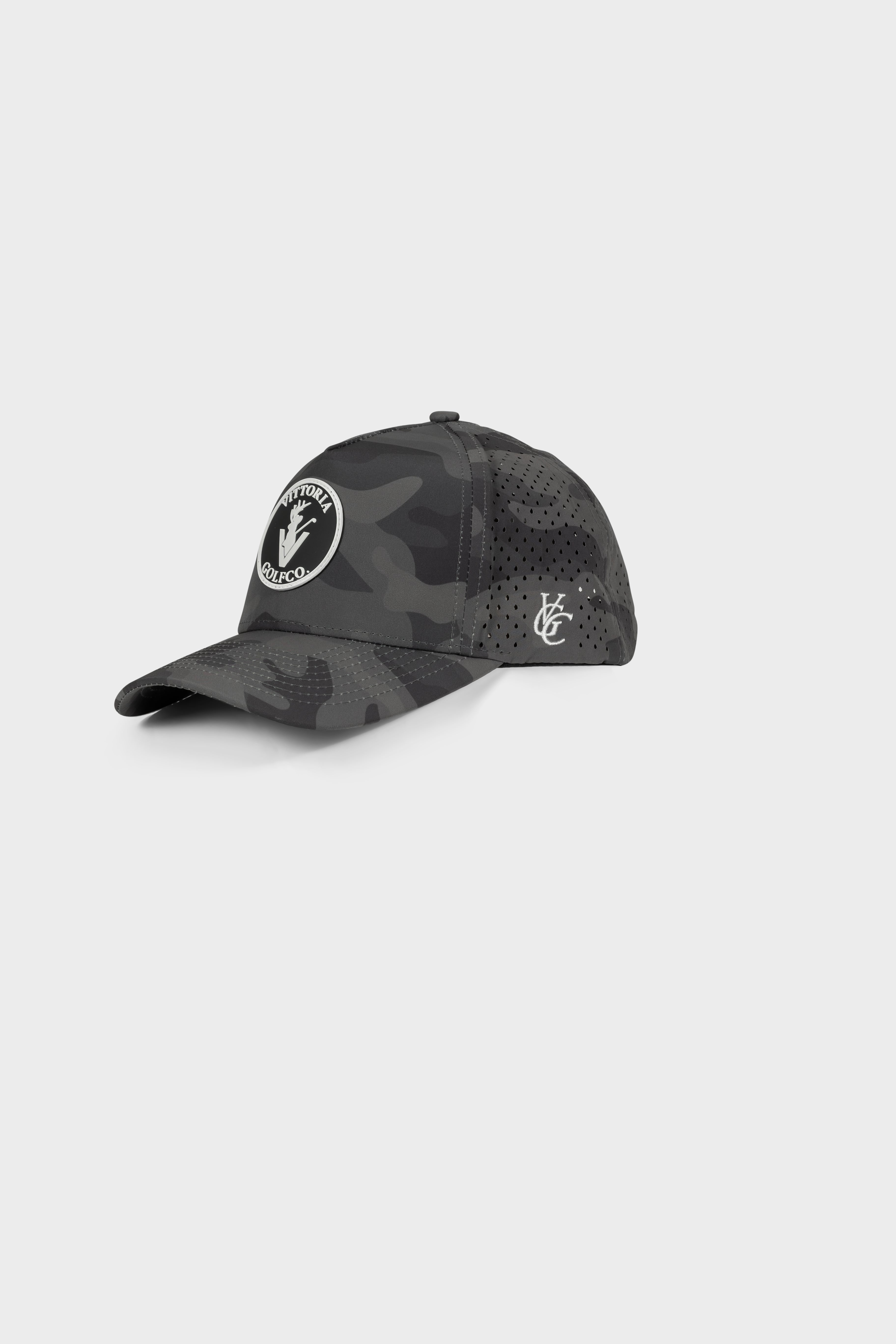 The Invincible 2 Hat by VittoriaGolfco adjustable snapback cap in black camo pattern with logo patch