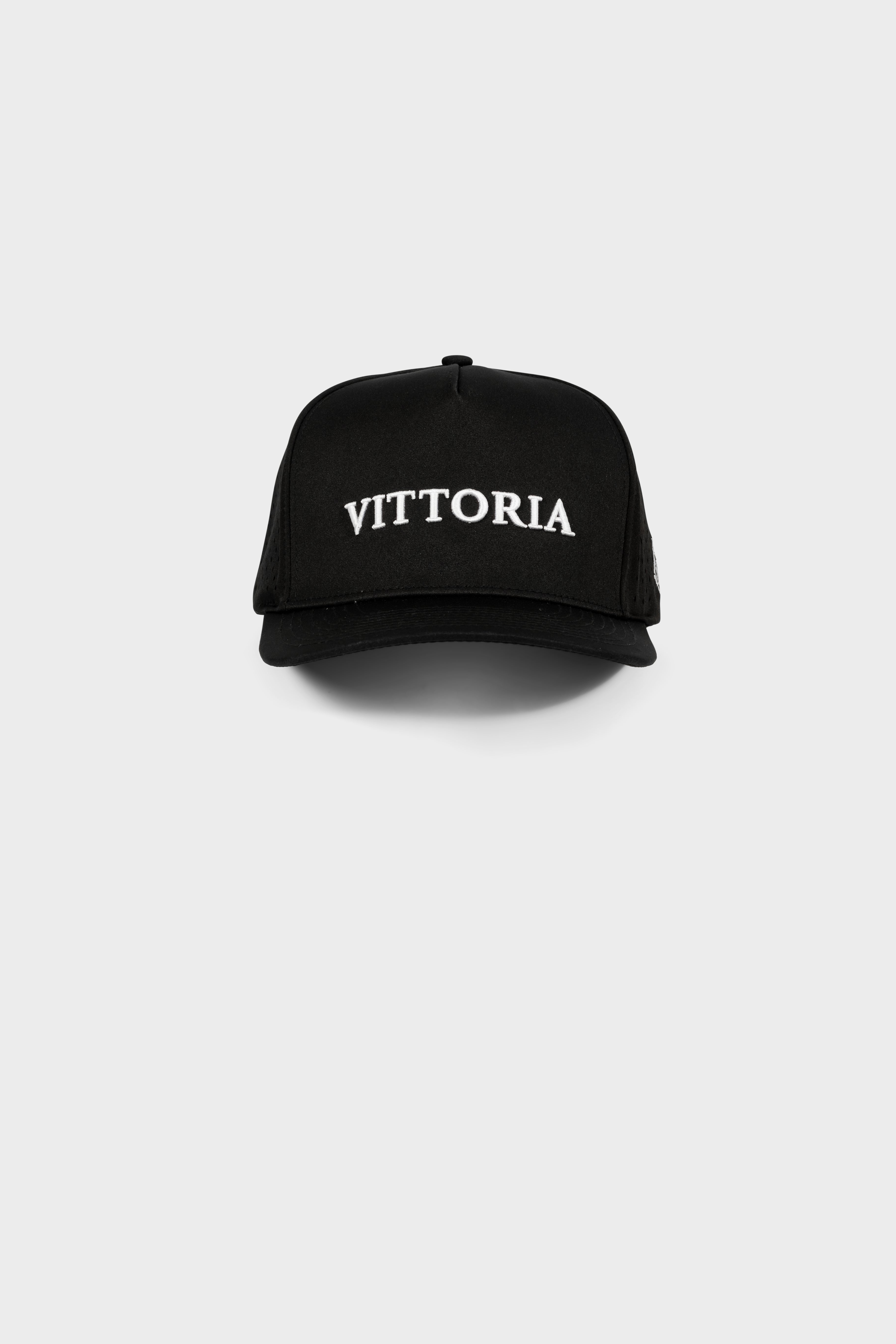 Black Performance VITTORIA Snapback hat with white logo and adjustable closure for golf and outdoor use
