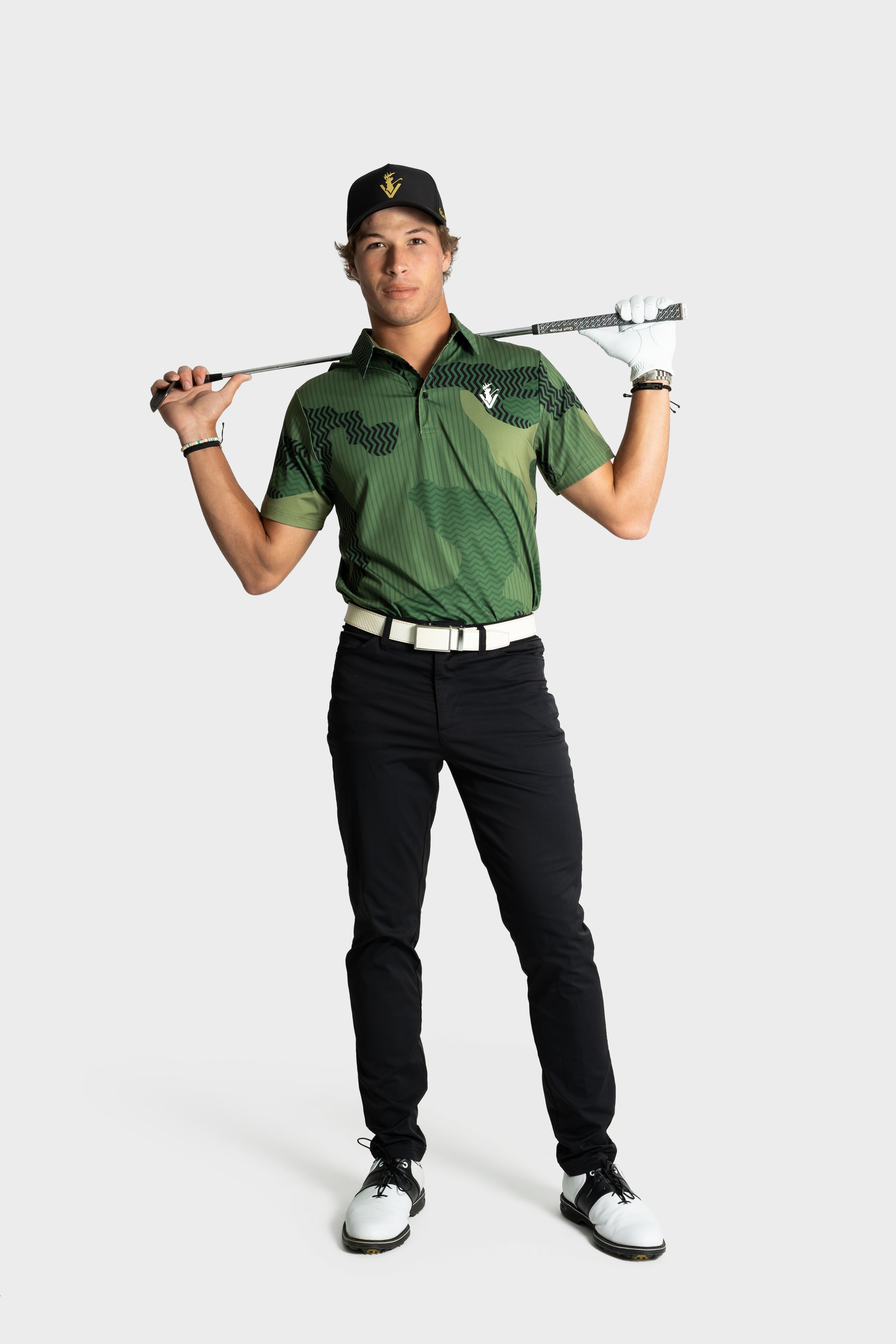 VittoriaGolfco Polo The Unseen green camouflage golf shirt modeled with cap and club