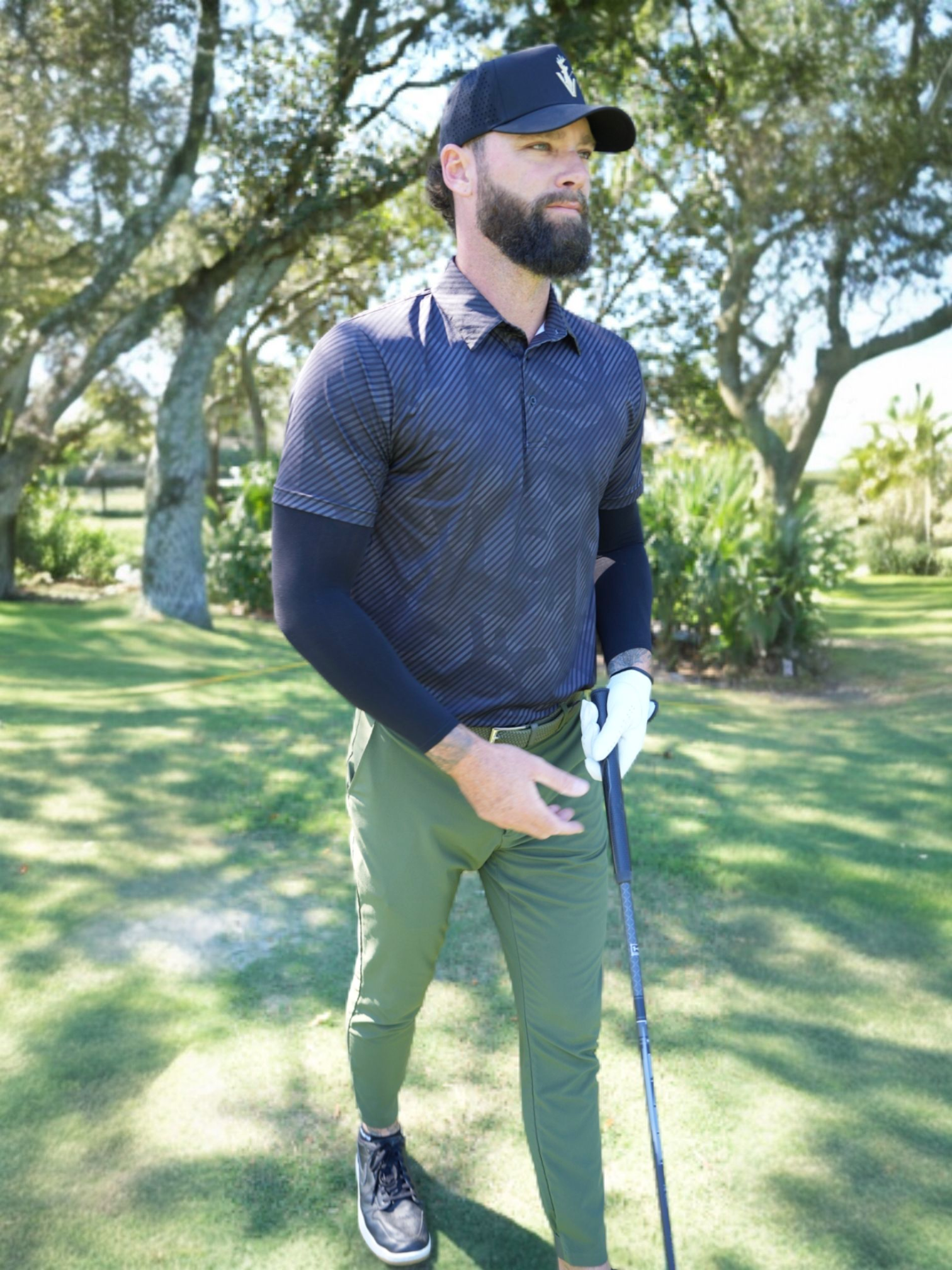 The Specter golf shoe in stealth black camo with stripe detailing for comfort and precision fit