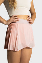 Lightweight pink pleated Perfetta golf skirt by Vittoria Golf Co with built-in shorts for comfort and performance