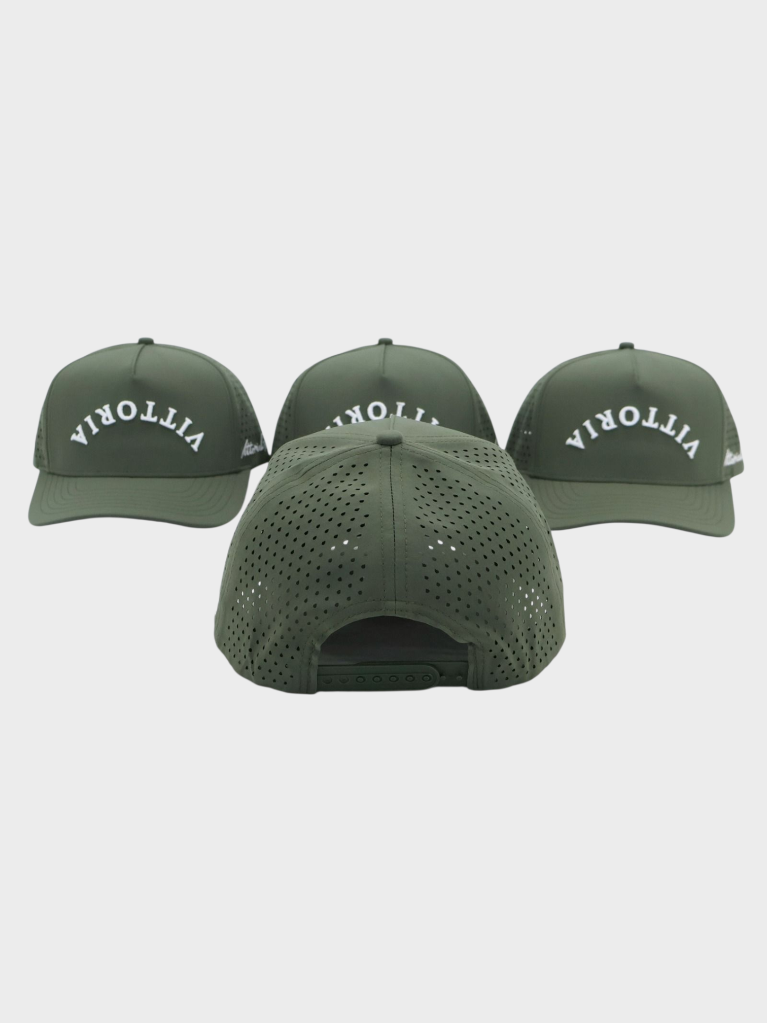Dark green adjustable snapback hat with perforated back and "VITTORIA" text in white, showcasing front and rear views.