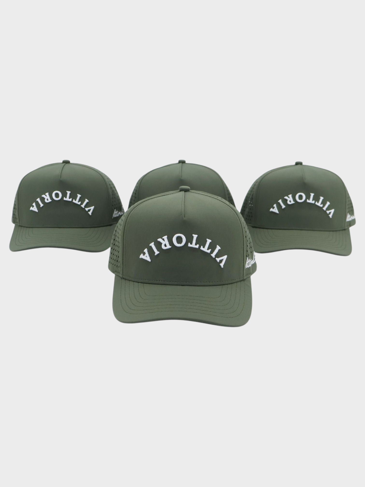 Green adjustable snapback hat with bold upside-down white lettering "VITTORIA" for golfers, The Upside Down design.