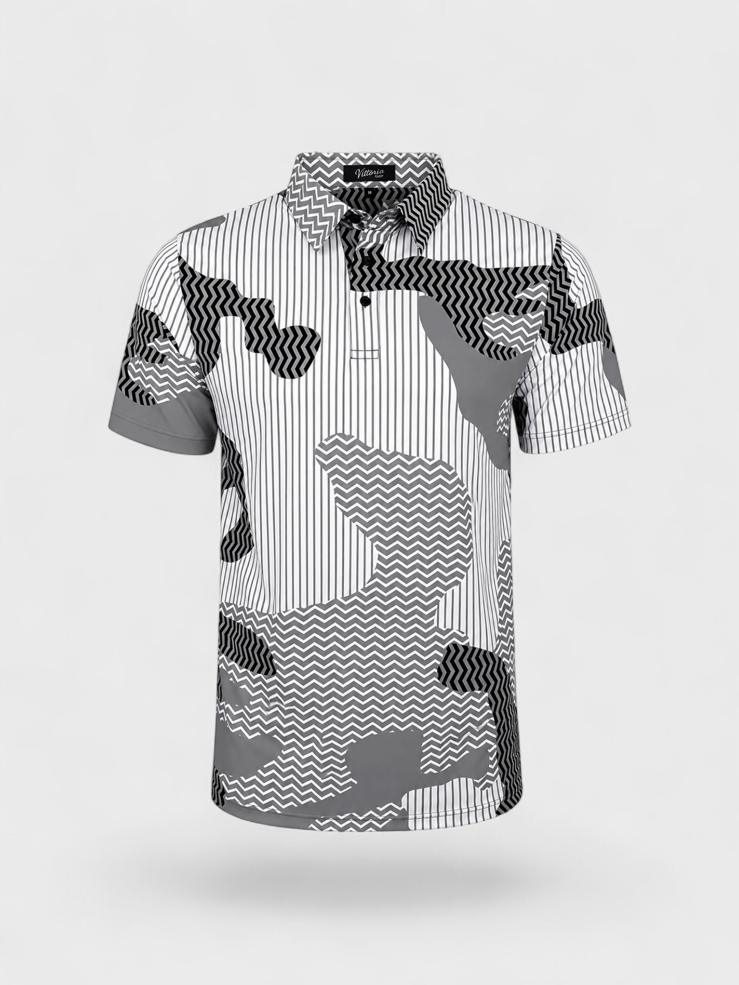 VittoriaGolfCo. performance golf polo featuring a monochrome camouflage and vertical stripe pattern with a three-button placket.